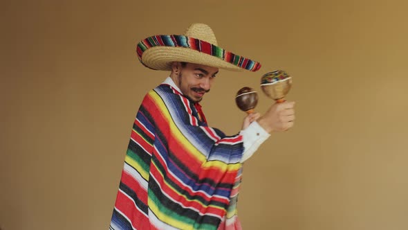 Young Mexican With Moustache Isolated On Yellow