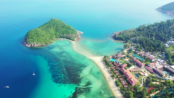 Aerial view scenery of tropical resort beach time by blue water and white sand background of a dayou