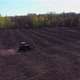 Tractor Plows the Field in Spring - VideoHive Item for Sale