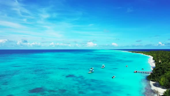 Aerial seascape of perfect resort beach time by blue lagoon with white sandy background of a dayout 