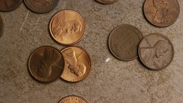 Rotating stock footage shot of American pennies (coin - $0.01) - MONEY 0159