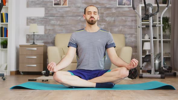 Guy Relaxing Practicing Yoga