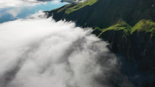 Aerial view of Unalaska Bay with fog on Unalaska island, Alaska, United States.