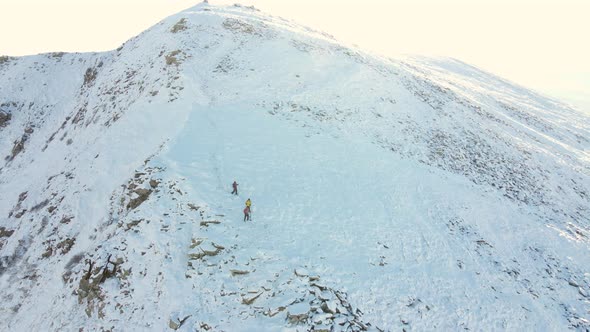 Three Travelers Descend From Mountain