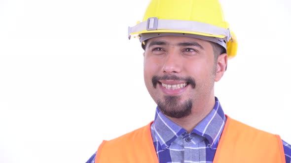 Face of Happy Bearded Persian Man Construction Worker Thinking