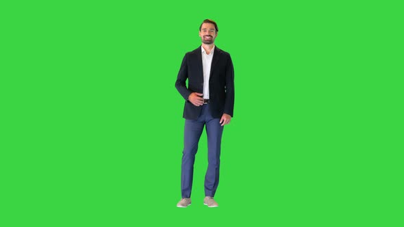 Handsome Young Business Man Happy Smile on a Green Screen Chroma Key