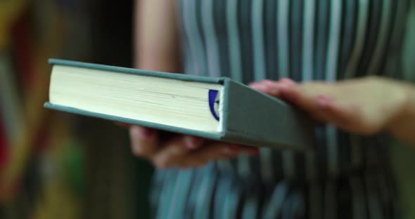 Close View of Opening the Book By Female Hands