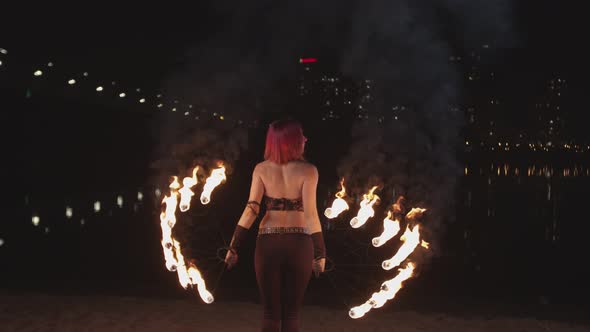 Pink-haired Firegirl Dancing with Flaming Fans