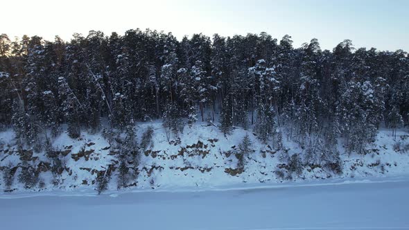 Steep Bank Of A Frozen River