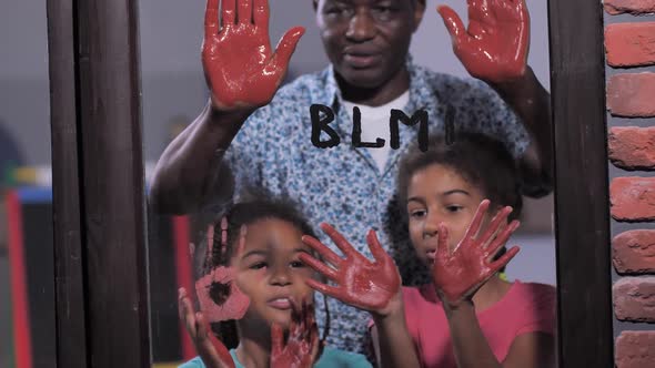 Family Supporting Black Lives Matter Movement