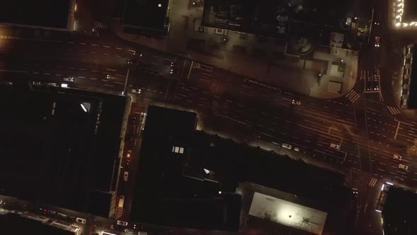 AERIAL: Slow Overhead Shot of City at Night with Lights and Traffic, Cologne, Germany 