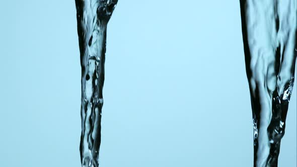 Water pouring and splashing in ultra slow motion 1500fps on a reflective surface - WATER POURS 168 alt