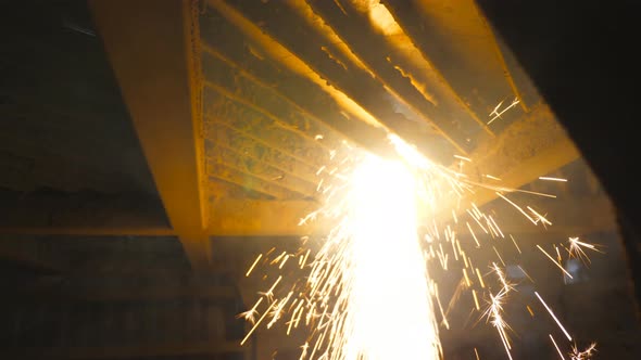 Many Bright Sparks Fly From Hot Metal During Plasma Cutting with a Cnc