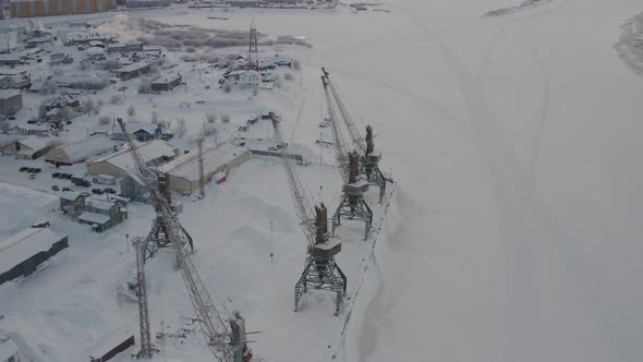Port Cranes in the Port in the Arctic City of NaryanMar