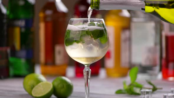 Bottle Pouring Drink Into Glass