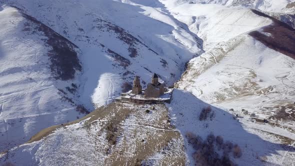 Aerial Footage of Lonely Old Medieval Gergeti Trinity Church