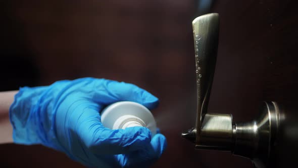 Safety in Public Spaces, Closeup of Man Hands Using a Sanitizer and a Wet Towel for Desinfection