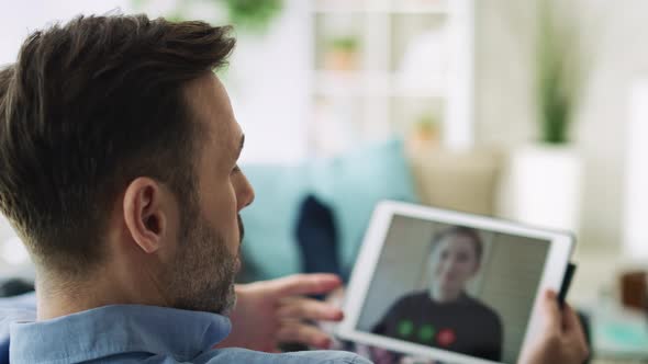 Video of man having video conference with a workmate. Shot with RED helium camera in 8K.