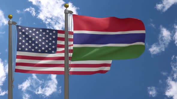 Usa Flag Vs The Gambia Flag On Flagpole