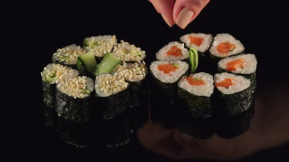 Closeup Hand of Japanese Chef Making Sushi