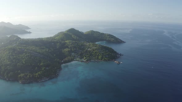 Aerial view of the endless coastline near Anse a La Mouche, Seychelles.