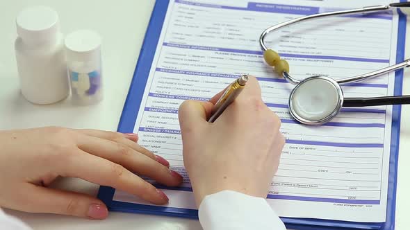 Female M.D. Filling Out Patient Registration Form, Keeping Clinical Records