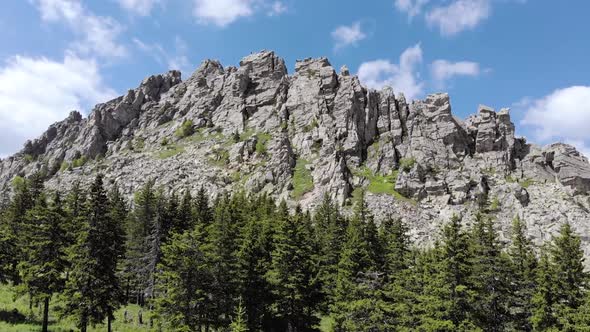 Drone Flight Around Huge Rock at Summer