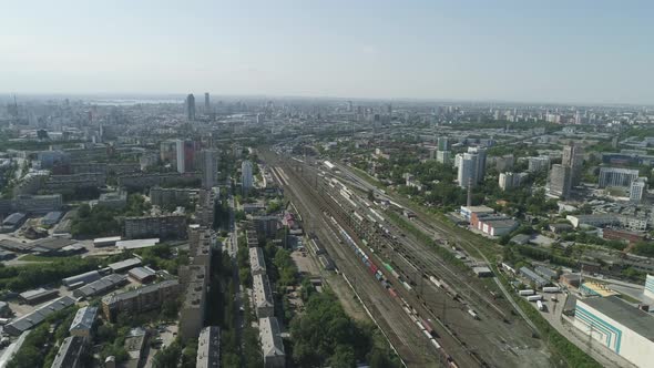 Aerial view of Rail Station with freight trains in a big city. 03