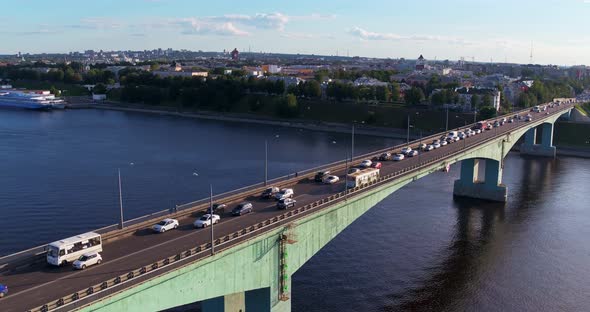 Cars Traffic Over the Bridge Across the River