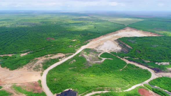 Aerial shot of the crater produced by the extraction of minerals from the earth in San Pedro de Maco