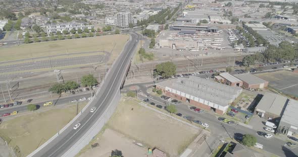 Aerial hyperlapse looking down over the Dandenong industrial zone showing movement on the many roads