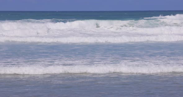 Super slow motion waves and beach at seaside in Cornwall