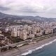 Aerial View Flying over the Resort Town Near the Embankment and the Mediterranean Sea - VideoHive Item for Sale