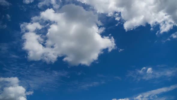 Clouds Move Smoothly in the Blue Sky. Timelapse