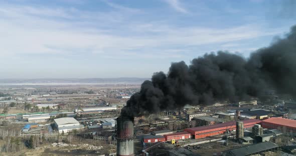 Smokestack of Coal-fired Power Plant Fossil Fuel Power Station Releasing Black Smoke Air Pollution