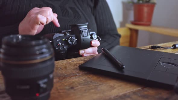 Woman Who Views Photo on Camera Monitor