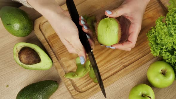 Woman's Peels and Cuts Kiwi