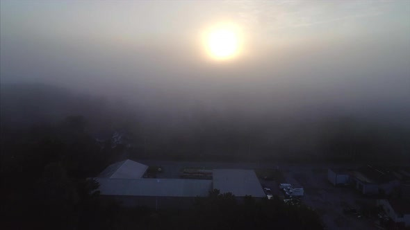 Bright Sunrise on a Foggy Morning by Brewster Train Station