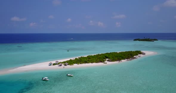 Beautiful drone copy space shot of a white sand paradise beach and turquoise sea background in high 