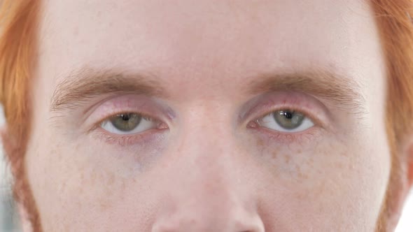 Close Up of Eyes of Casual Redhead Man