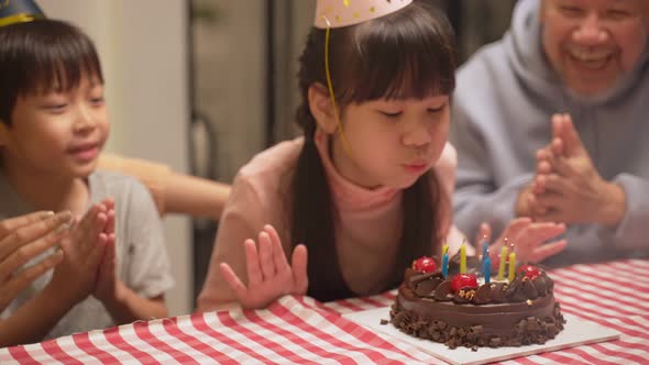 Happy family, Asian big family having small party eating food on dining table together at home.