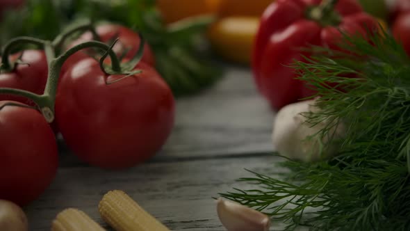 Dolly in Shot of Natural Fruits and Vegetables on Kitchen Table