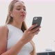 Young woman outdoor using smartphone listening music - VideoHive Item for Sale