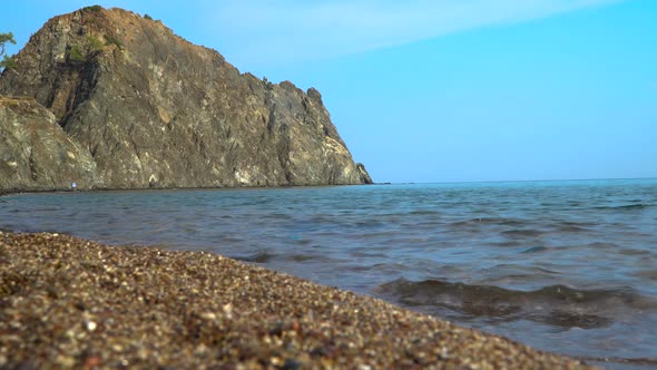 The Child Bathes and Plays in the Sea