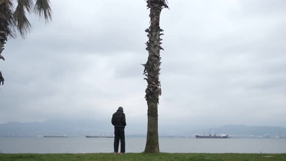 Thoughtful Sad Man Cross Sea