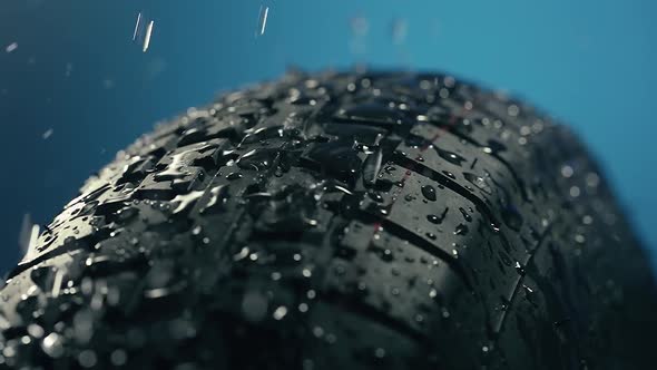 Water Dripping on a Car Tire