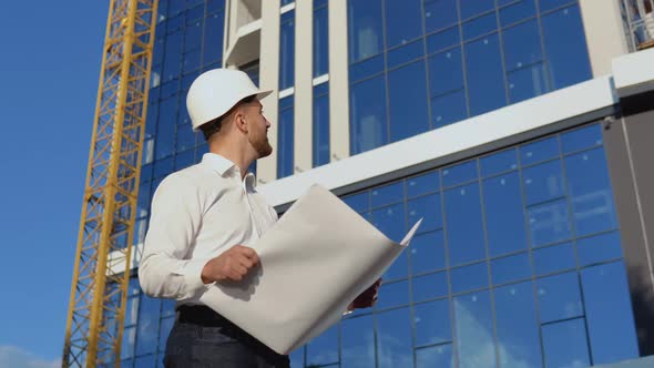 Architect Engineer Reads Project Drawings