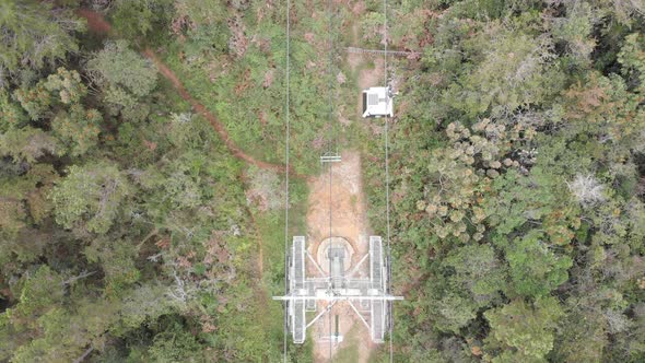 Top Down View Of Nature Preserve and Cable Car System at Arvi Park in Colombia - aerial drone shot