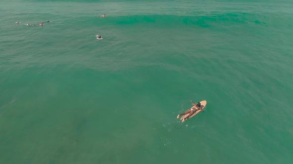 Flyover Asian Indian Surfer Girl Catching A Wave 3