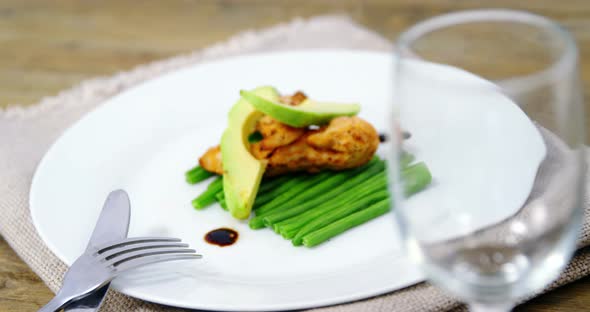 Chopped vegetables decorated on plate with wine